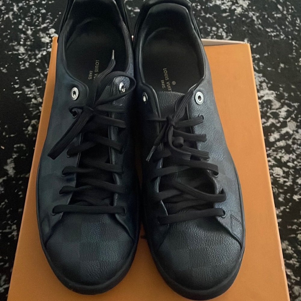 Louis Vuitton sneakers.